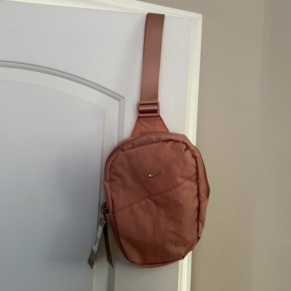 Nike Handbags - Brand new”NIKE”shoulder bag.Size-W 9”x12”inch.Color-peach.🧡